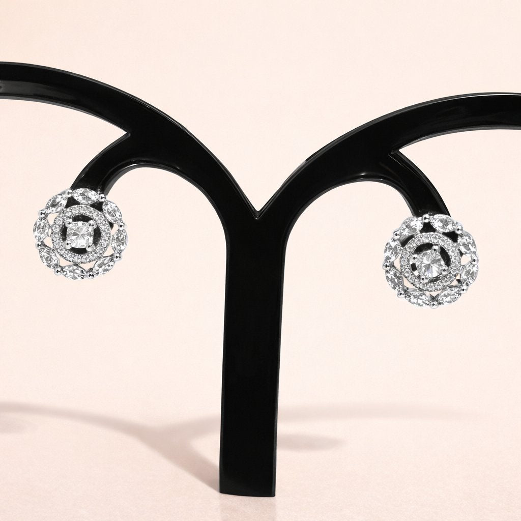 Diamond AD Earrings for Women on a black earring stand against a light pink background