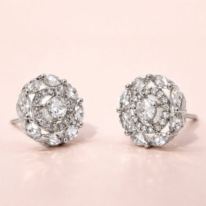 Pair of diamond AD Earrings for Women on a light pink background