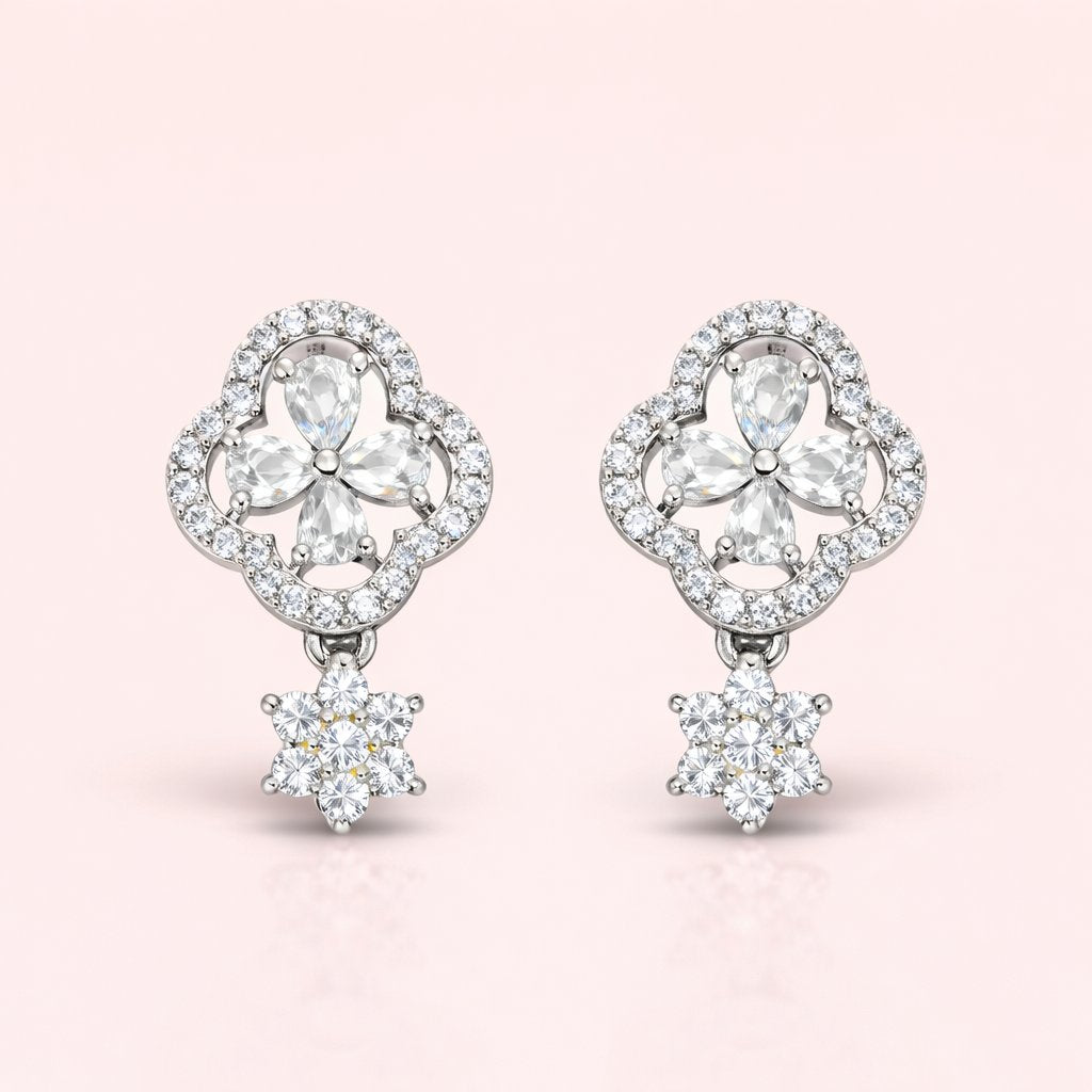 Pair of diamond AD Earrings for Women on a pink background