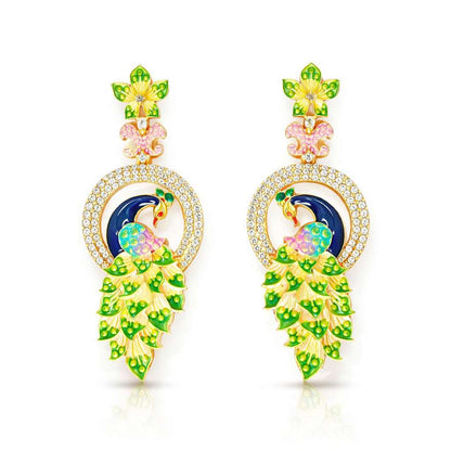 Pair of silver AD Earrings for Women with green gemstones on a white background