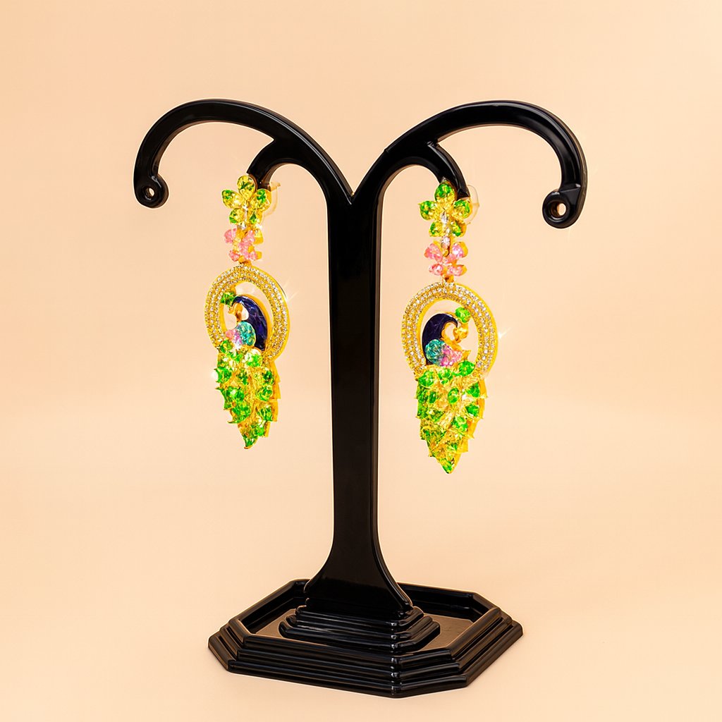 Pair of ornate AD Earrings for Women on a black stand against a beige background
