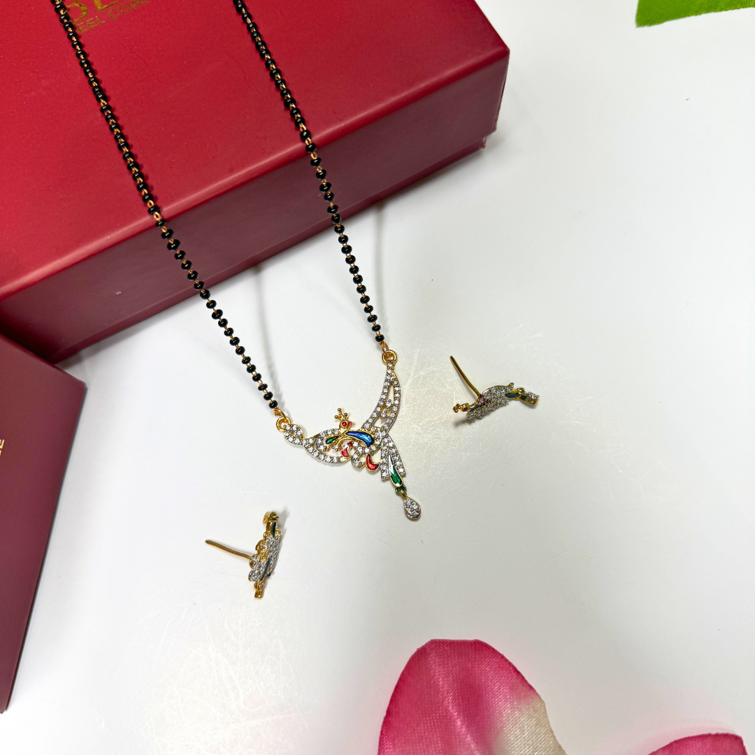 AD Mangalsutra Jewelry set with necklace and earrings on a white surface with a red box in the background.