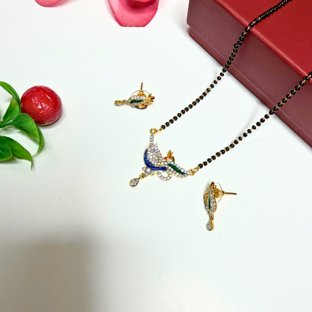 Jewelry set with necklace and earrings on a white surface
