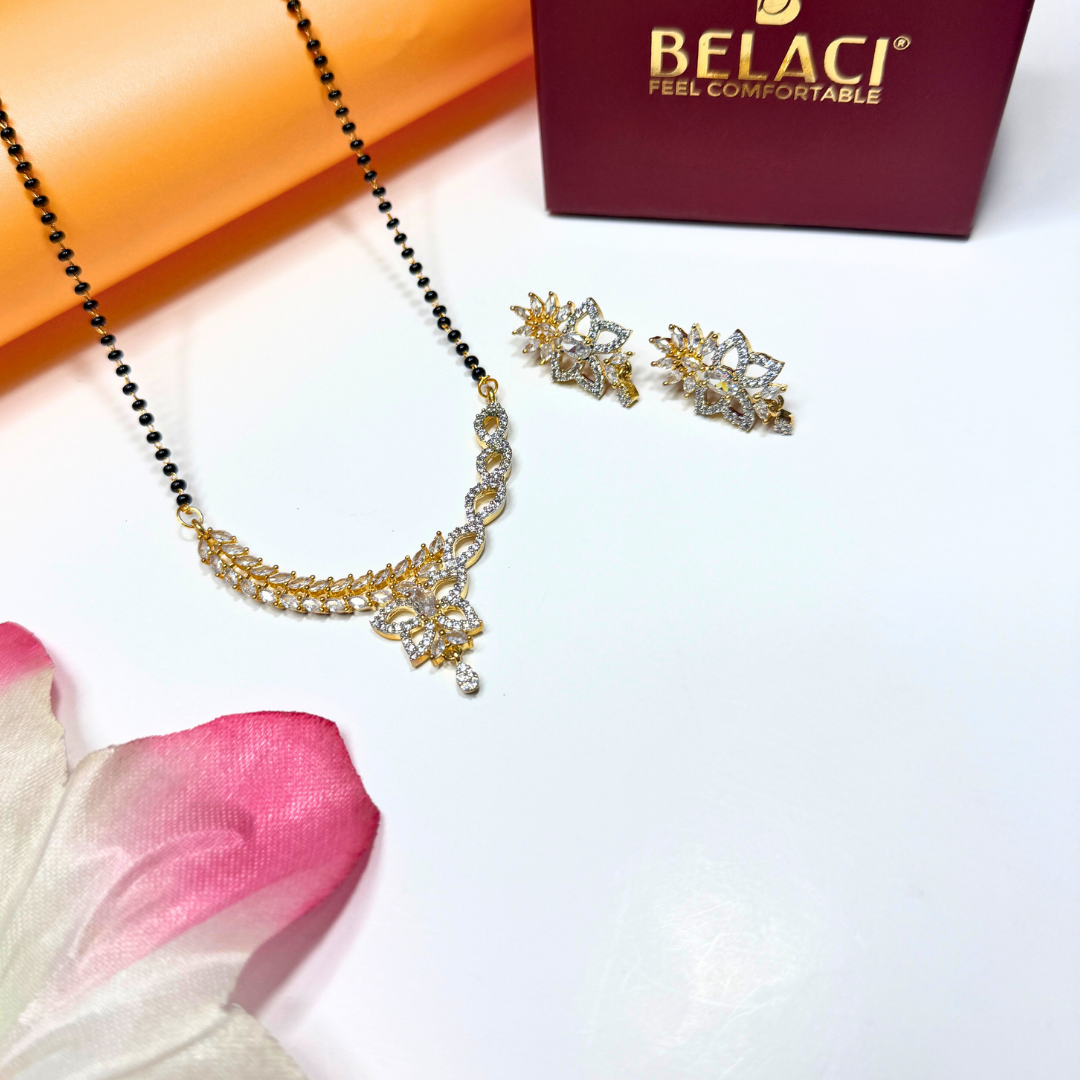 AD Mangalsutra Jewelry set with necklace and earrings on a white surface, Belaci brand visible.