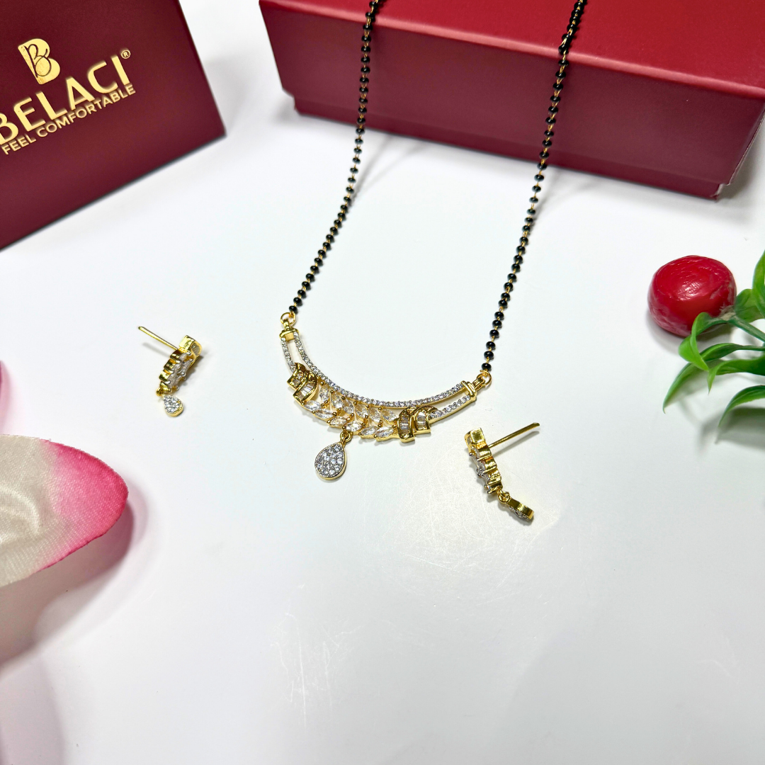 Gold AD Mangalsutra and earrings with a Belaci box on a white background