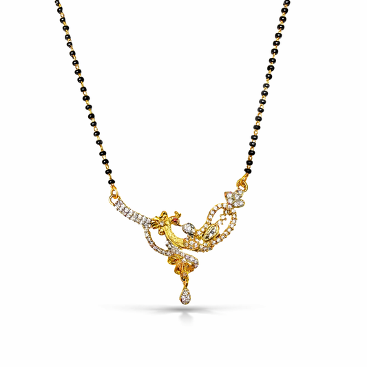 Gold AD with black beaded chain on a white background